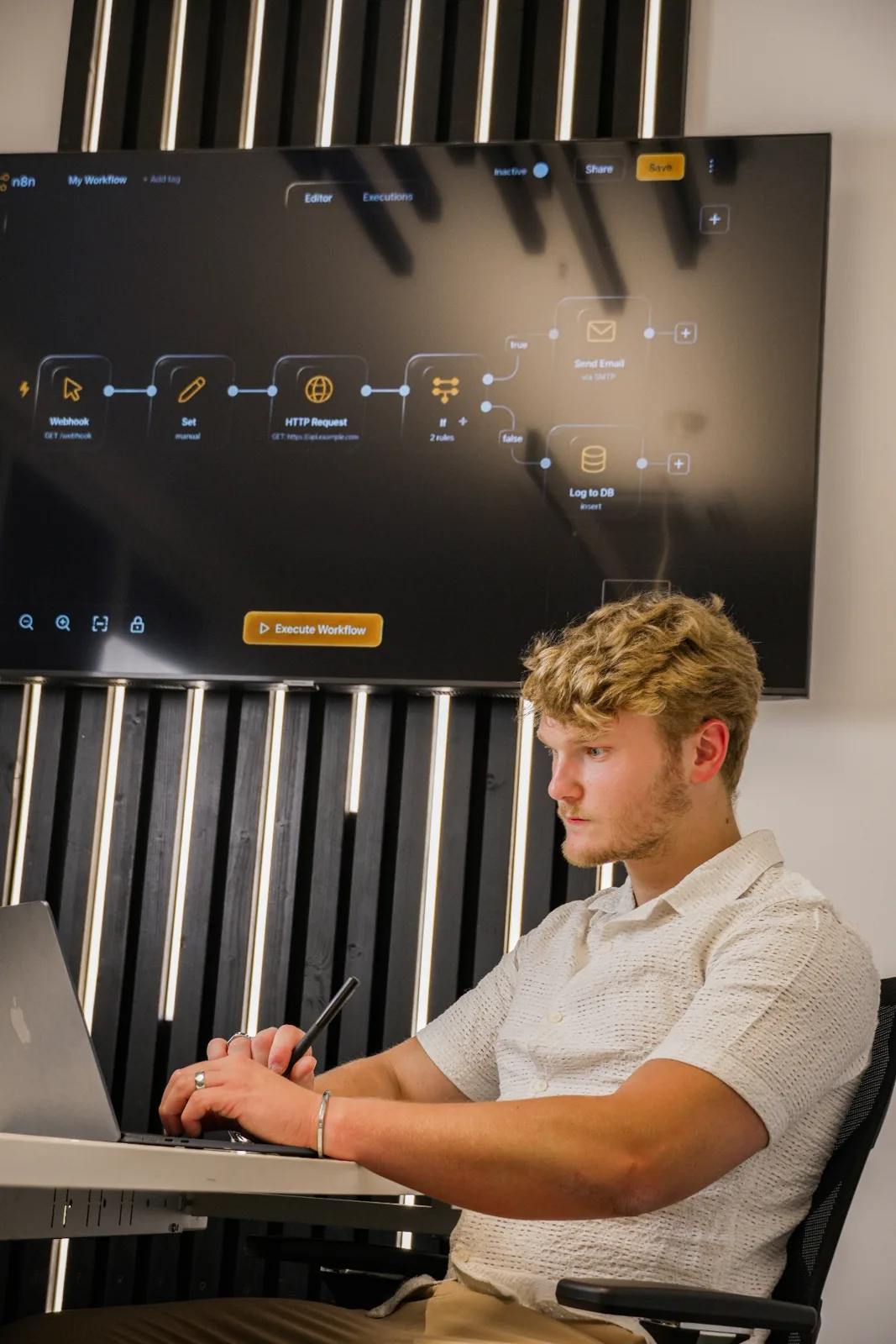 Web and Grow team member building an n8n automation workflow